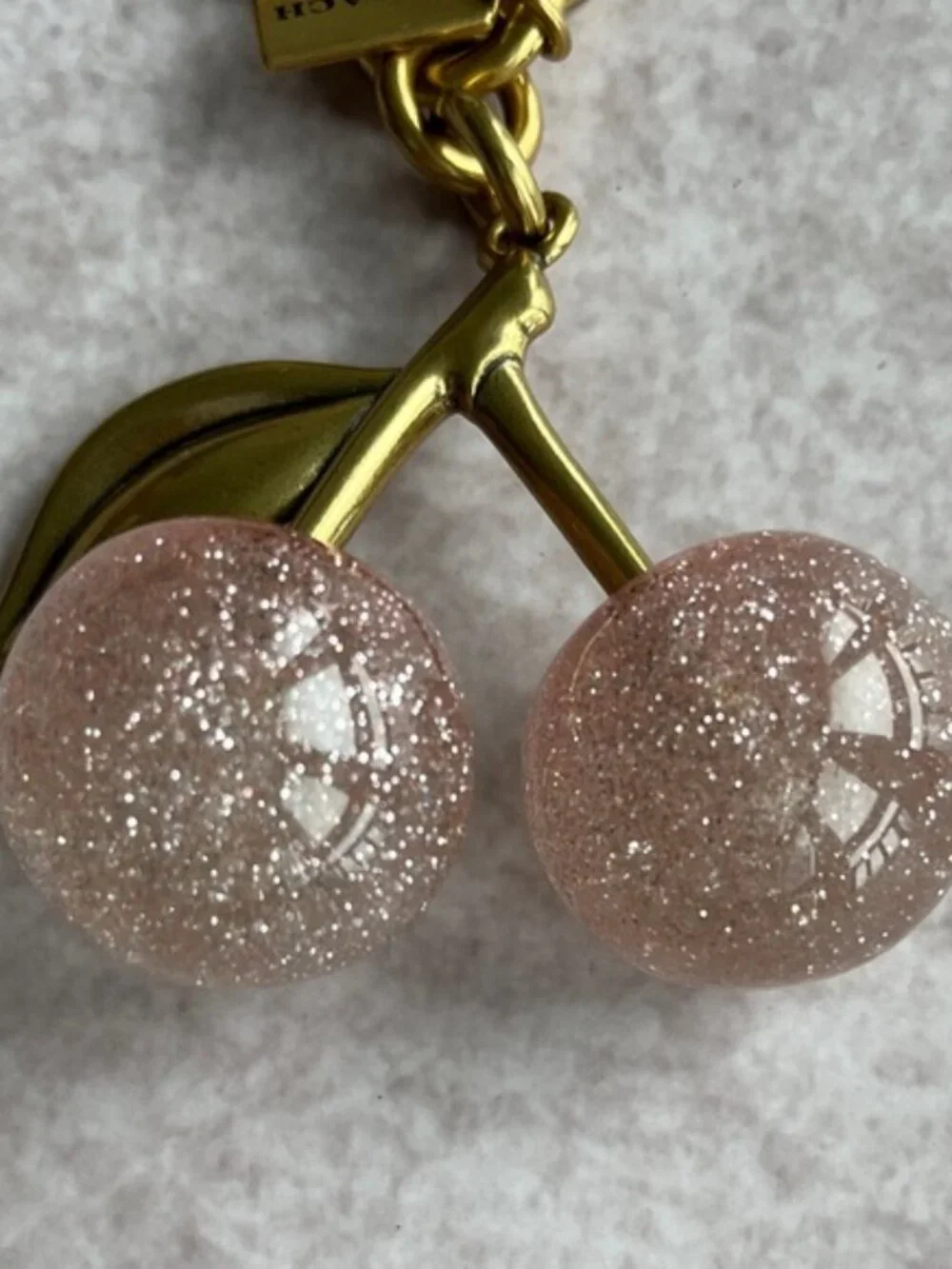 COACH Pink Glitter Cherry Bag Charm with Gold Hardware